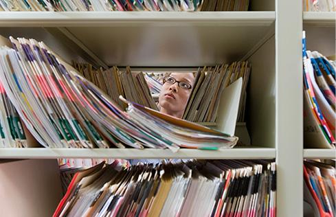 Women looking through medical records
