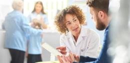 Doctor speaking with patient